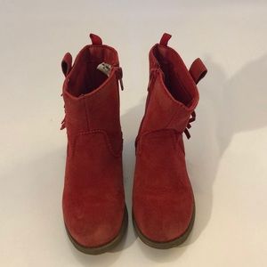 Girls red boots.